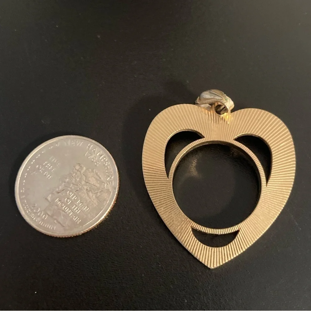 Golden heart pendant.